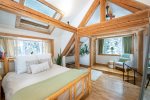 The 3rd floor master bedroom is a tranquil treetop oasis.